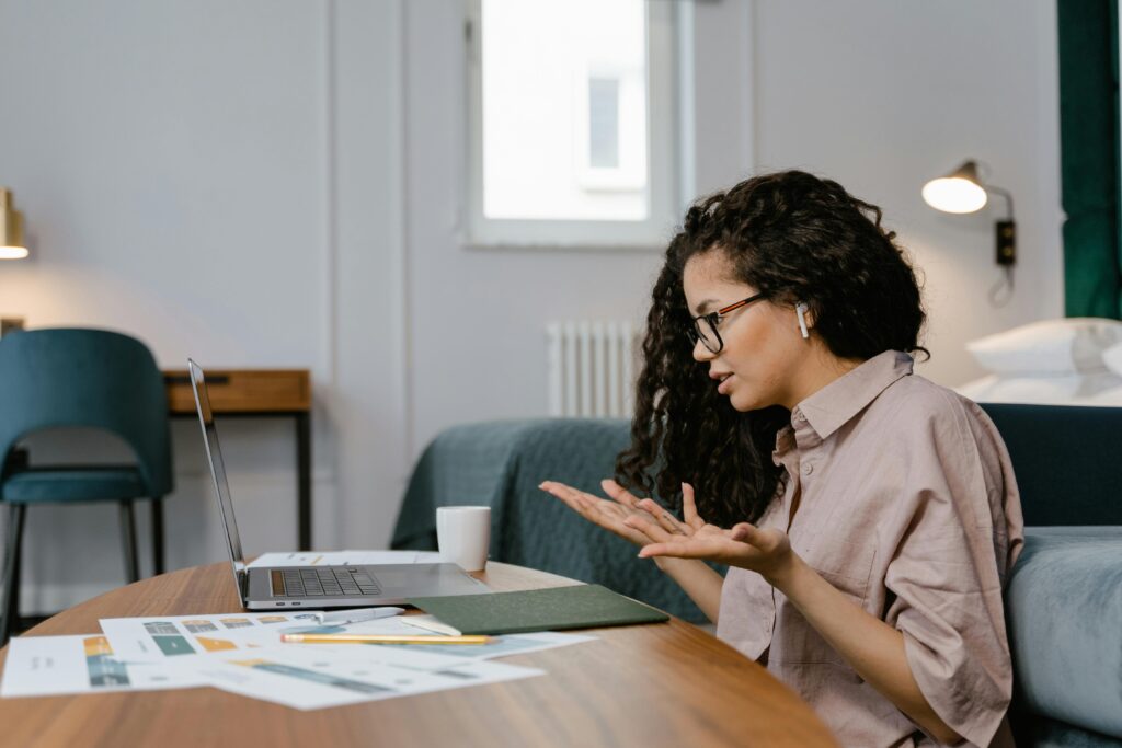 A group of diverse individuals participating in a virtual therapy session provided by Thrive's Virtual Intensive Outpatient Program.