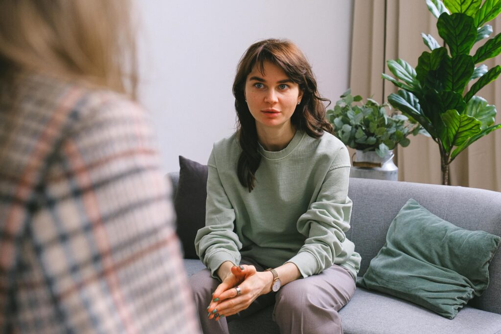 Professional healthcare team conducting a virtual group therapy session for an intensive outpatient program.