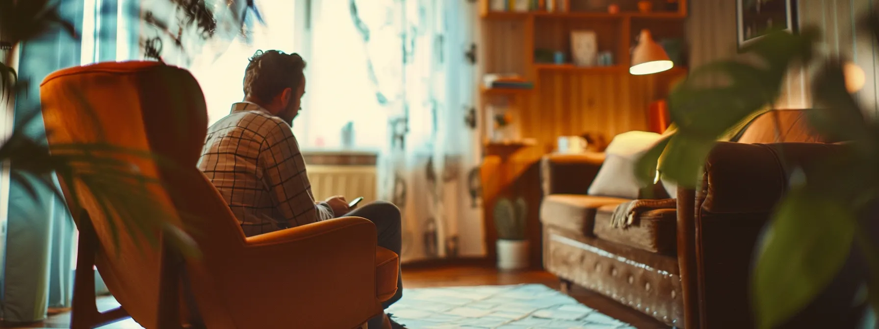 a person sitting in a cozy office surrounded by soothing colors and calming decor, talking comfortably with a compassionate therapist.